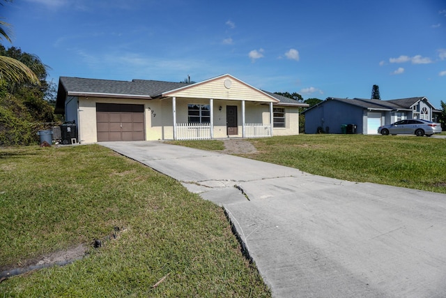 single story home featuring a porch, a garage, and a front lawn