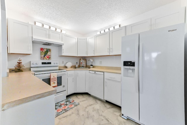 kitchen featuring white cabinets, white appliances, sink, and a textured ceiling