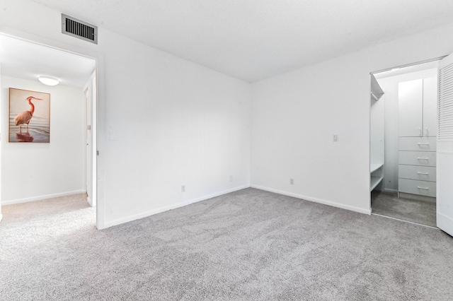 unfurnished bedroom with carpet floors