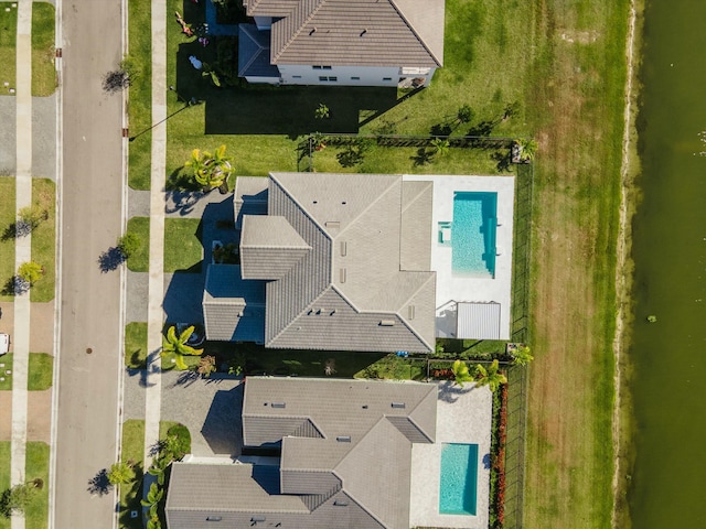 bird's eye view with a water view