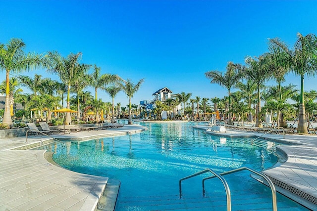 view of swimming pool with a patio