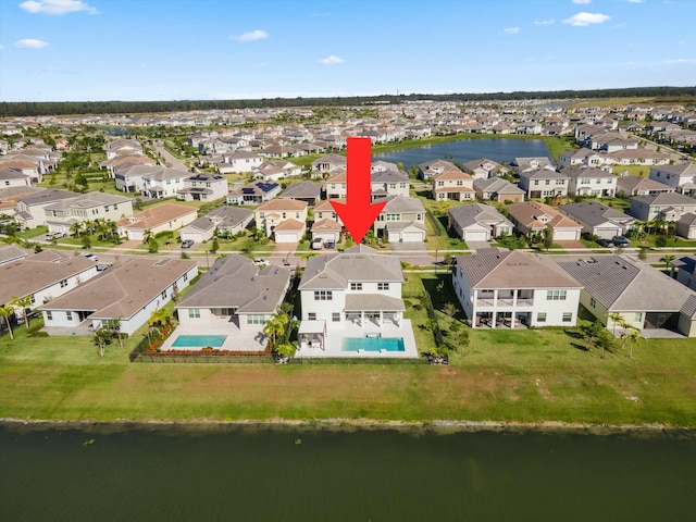 birds eye view of property featuring a water view