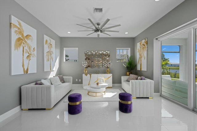 living room with ceiling fan