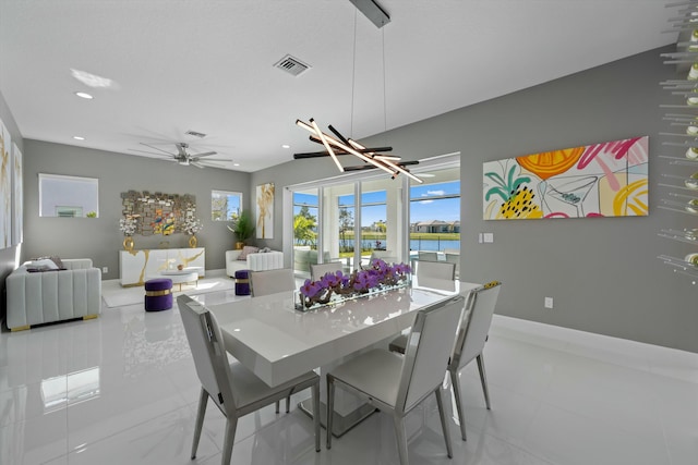 dining space with ceiling fan