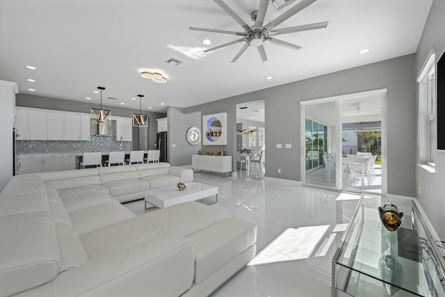 living room with ceiling fan