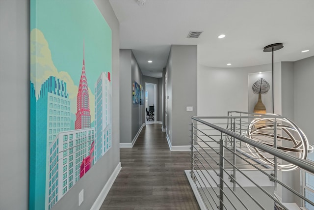 hallway featuring dark hardwood / wood-style flooring