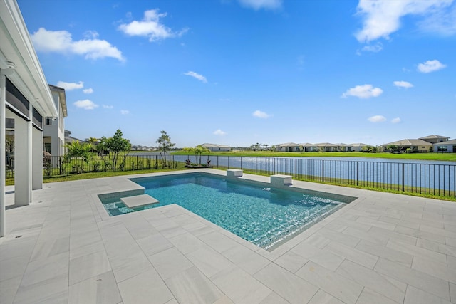 view of swimming pool featuring a water view and a patio