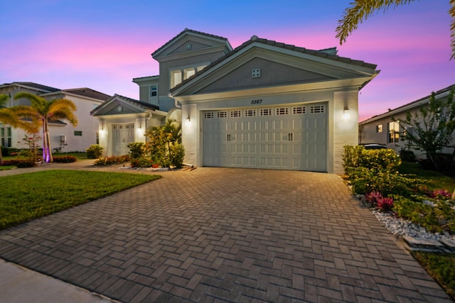 view of front of home with a garage