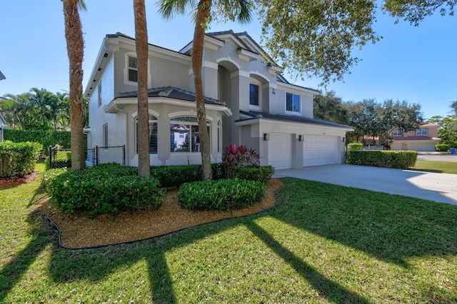 view of front property with a front yard and a garage