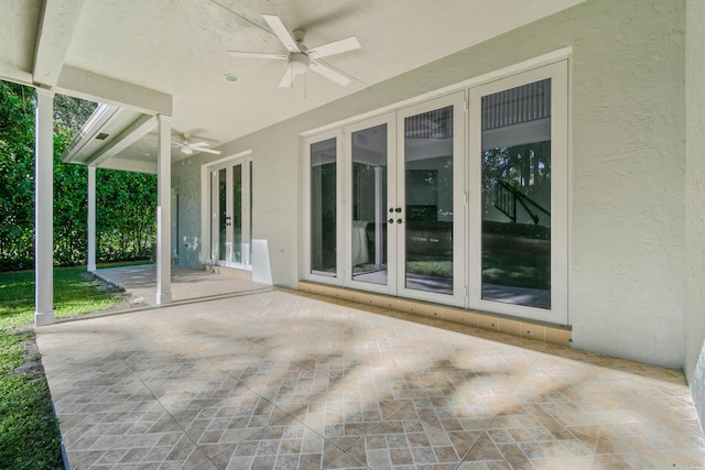 view of patio / terrace featuring ceiling fan and french doors