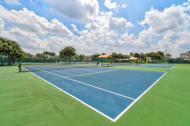 view of tennis court with basketball court