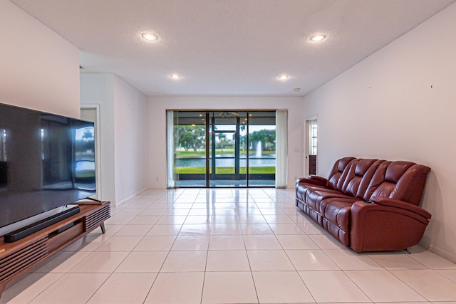 game room featuring light tile patterned floors