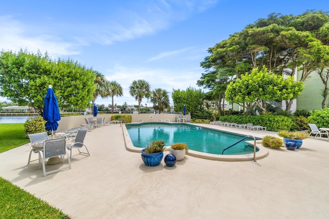 view of pool featuring a patio area