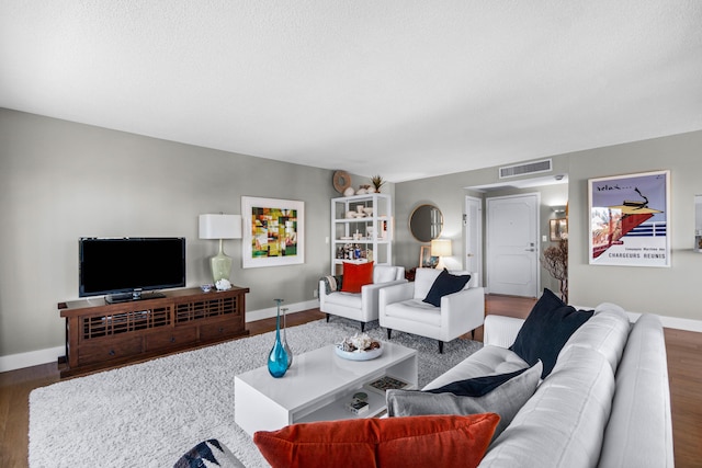 living room with dark hardwood / wood-style floors