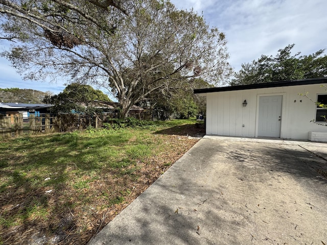 view of yard featuring a patio area and fence