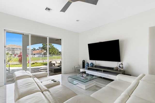 living room featuring ceiling fan