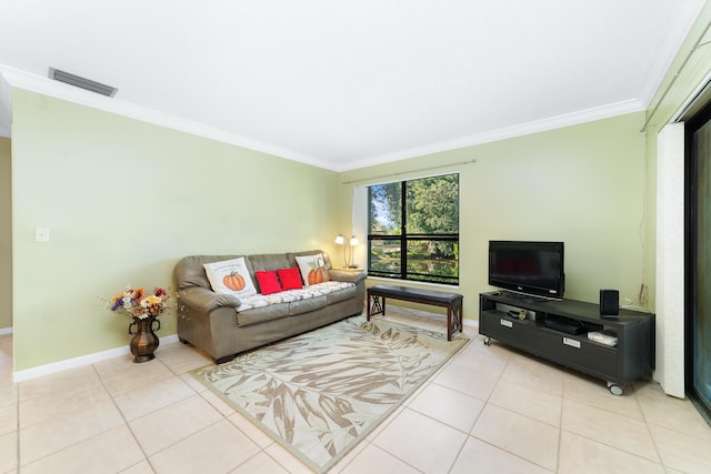 living room with light tile patterned floors and crown molding