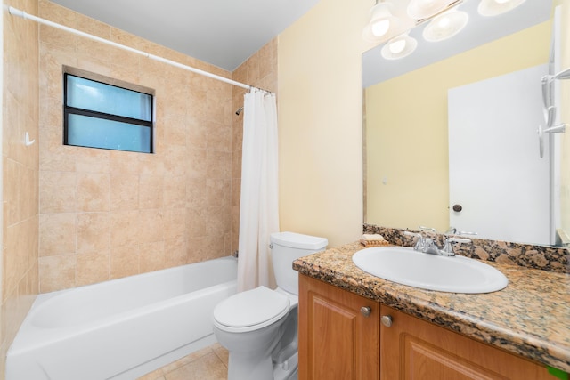 full bathroom with shower / bath combo with shower curtain, tile patterned flooring, vanity, and toilet