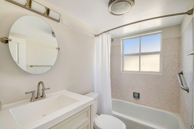 full bathroom featuring vanity, toilet, and shower / bath combo with shower curtain