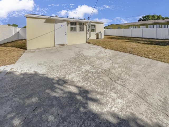 back of house featuring a patio area