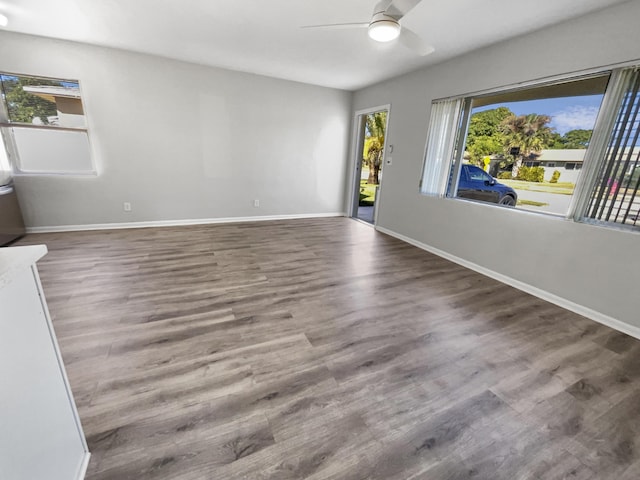 unfurnished room featuring hardwood / wood-style flooring and ceiling fan