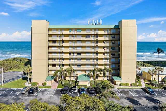 view of building exterior with a water view