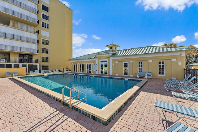 7370 S Ocean Dr Unit 111, Jensen Beach, FL 34957 - community pool featuring a patio area