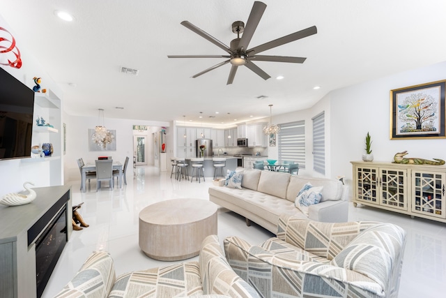 living room with ceiling fan