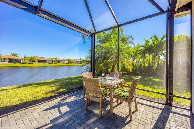 sunroom with a water view