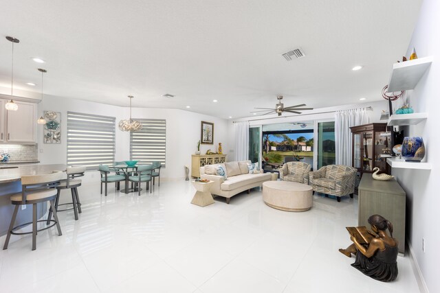 living room featuring ceiling fan