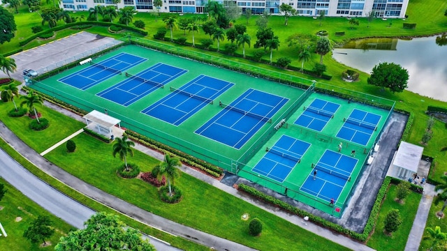 birds eye view of property featuring a water view