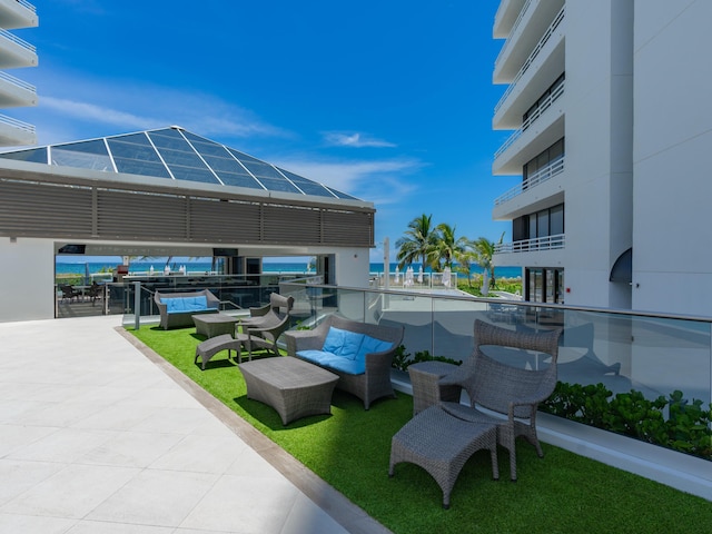 view of patio / terrace with an outdoor hangout area and a balcony