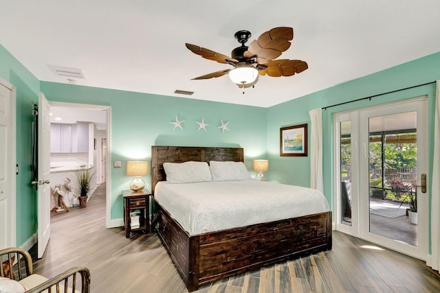 bedroom featuring ceiling fan, access to exterior, and light hardwood / wood-style flooring