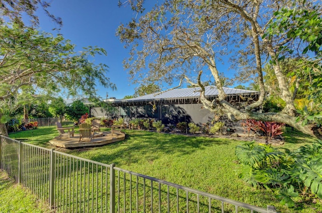 view of yard with a wooden deck