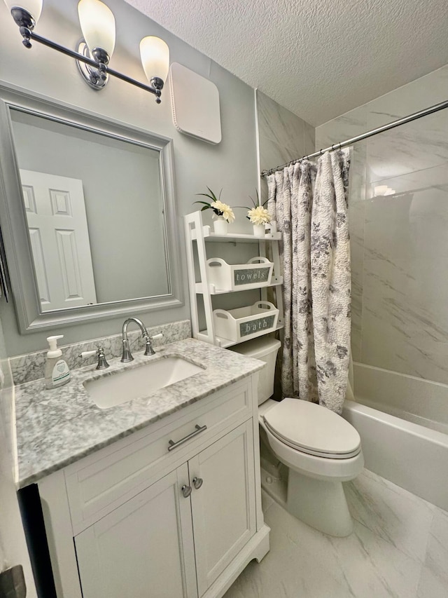 full bathroom with vanity, shower / bath combination with curtain, toilet, and a textured ceiling