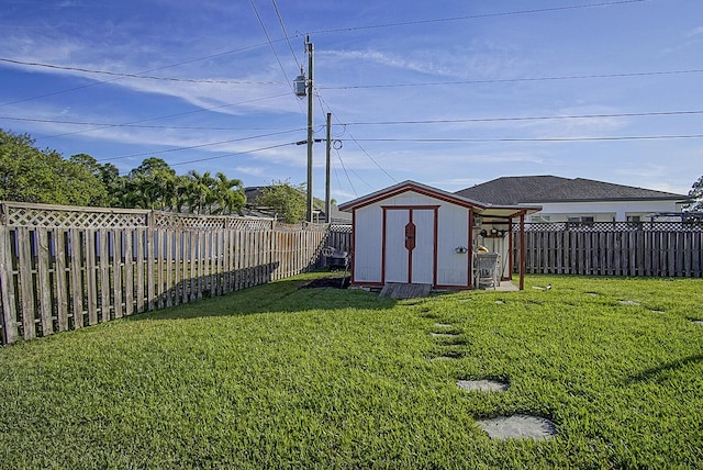 view of yard with a storage shed