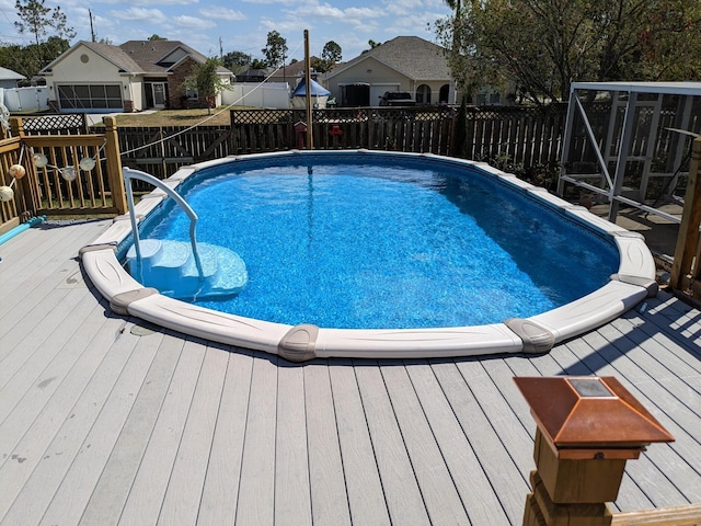 view of pool with a deck