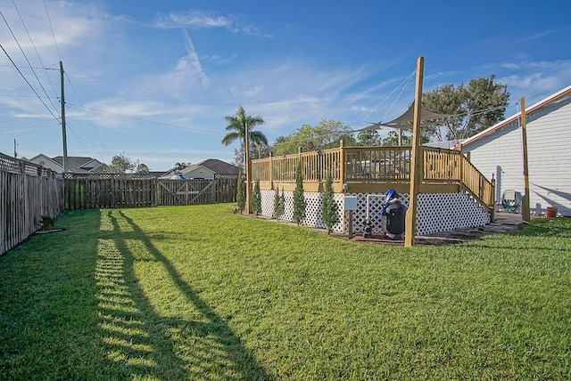 view of yard featuring a deck