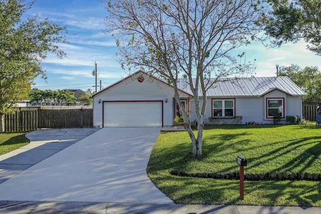 ranch-style house with a garage and a front lawn