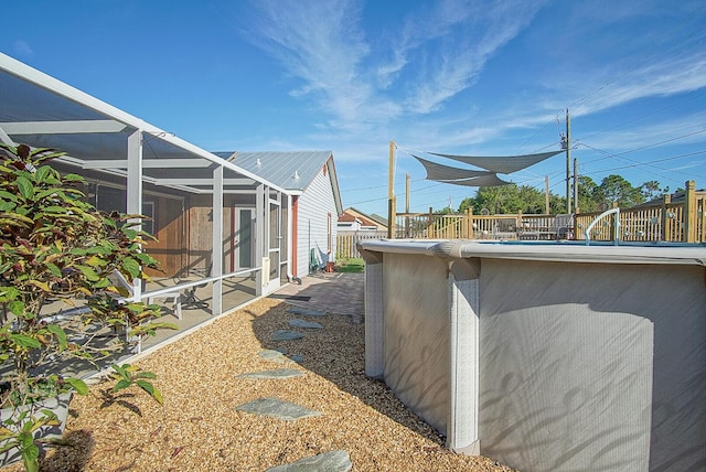 view of yard featuring a lanai