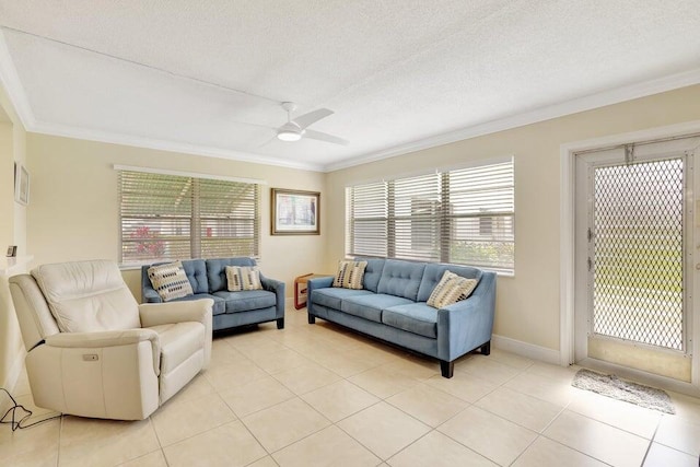 tiled living room with ceiling fan, crown molding, and a textured ceiling