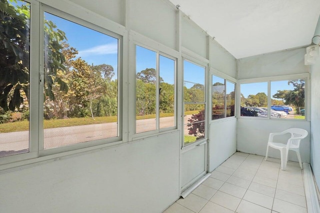 unfurnished sunroom featuring plenty of natural light