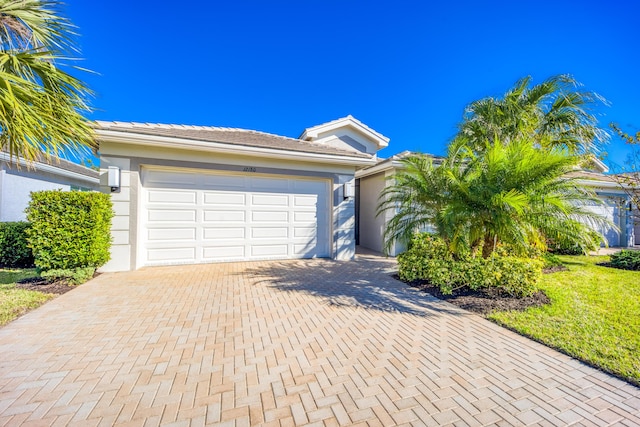 view of front of property with a garage