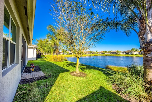 view of yard with a water view