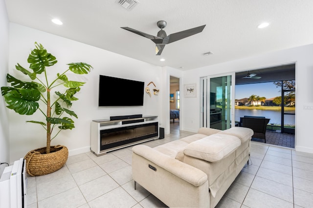 tiled living room featuring radiator