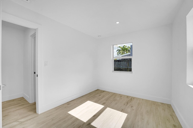 unfurnished room featuring light hardwood / wood-style floors