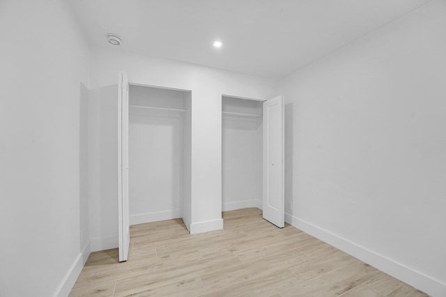 unfurnished bedroom featuring light hardwood / wood-style flooring