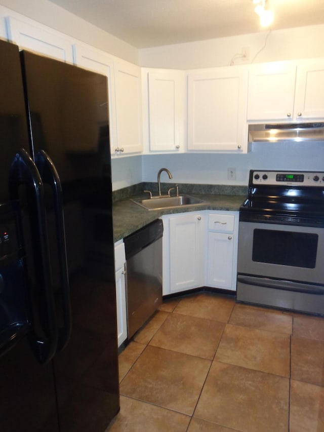 kitchen featuring sink, white cabinets, stainless steel appliances, and tile patterned flooring