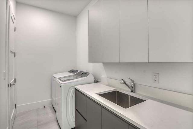 18416 Symphony Ct, Jupiter, FL 33458 - washroom featuring cabinet space, independent washer and dryer, baseboards, and light tile patterned floors