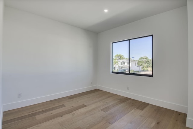 18416 Symphony Ct, Jupiter, FL 33458 - spare room featuring light wood-style floors, baseboards, and recessed lighting